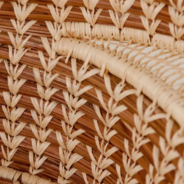 Lacy woven pine needle basket with handles