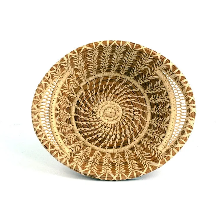 Lacy woven pine needle basket with handles